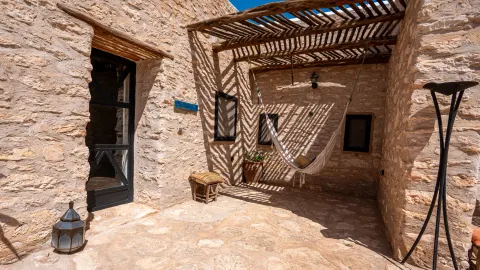 L'Ipoméa, patio privé avec hamac sous la pergola